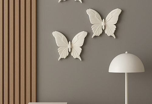 Decorative overlay NPU-479 &ldquo;Butterfly&rdquo; made of polyurethane on the smooth wall above the desk