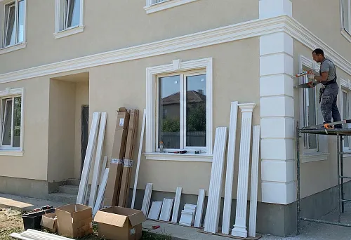 Installation of polyurethane facade molding: installation of trims and rustications on building corners with verified geometry