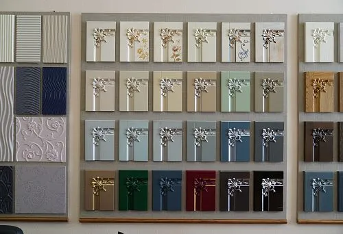 Collection of furniture facade samples with carved decorative inserts in various colors