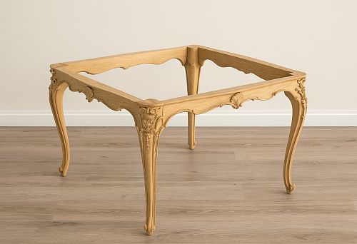 Journal table pedestal made of solid wood with carved details and curved legs in a classical style on a light floor
