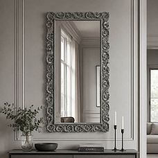 Carved frame RM-014 for a mirror in an interior with baroque elements.