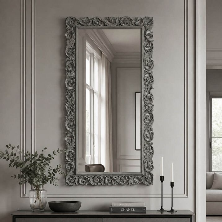 Carved frame RM-014 for a mirror in an interior with baroque elements.