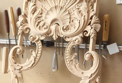 Carved decorative wood applique with classic elements
