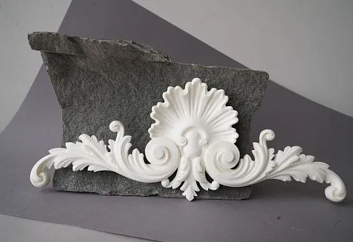 Polyurethane decorative element for modern interior on gray background