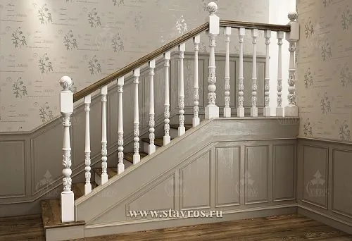 Staircase with the best white wooden balusters and carved detailing