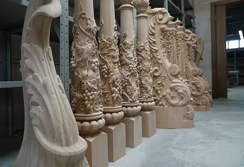 Carved brackets and columns &mdash; refined details for building decoration.