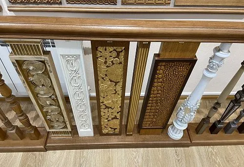 Wooden balcony railing with decorative carved elements