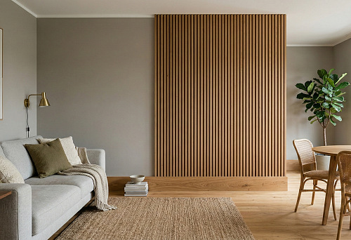 Wooden baseboard and slat wall panel: zoning a living room without partitions in a modern interior