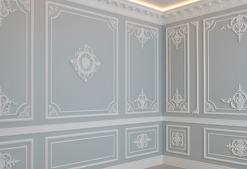 Wall decorative finishing system with polystyrene moldings and baseboards in a classic interior