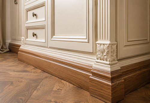 Classic-style furniture base: wooden moldings and polyurethane stucco