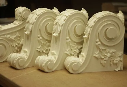 Decorative moldings with carved floral ornament in classical style