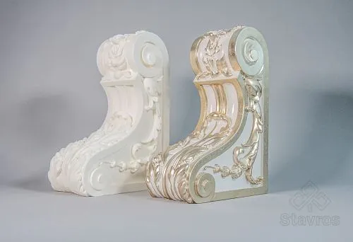 Pair of decorative brackets with relief carving, one gold-plated, the other white, for decorating wooden beams and interiors