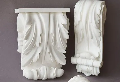 Decorative polyurethane brackets on a gray background