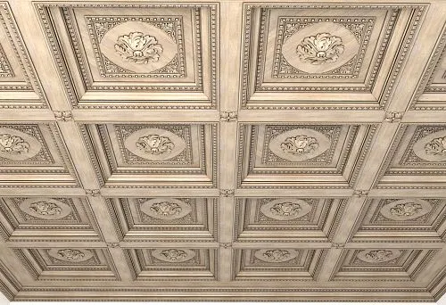 Elegant wooden ceiling with carved decorative panels