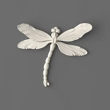 Molded decoration NPU-485 Dragonfly from white polyurethane on a gray background.