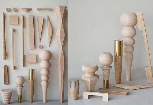 Set of decorative legs and details made of solid wood with metal inserts for furniture structures
