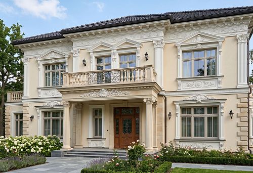 House with decorative facade elements, stucco, moldings, columns and architectural decor