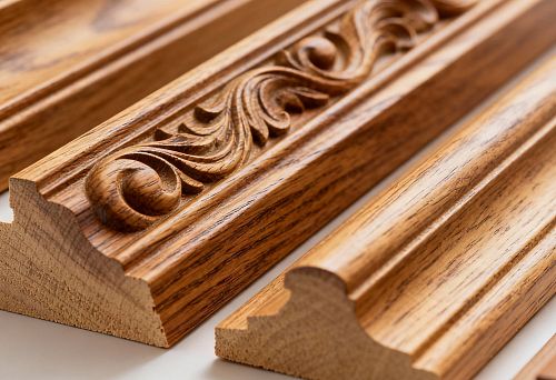 Wood trim with carved ornament and smooth finish for purchase