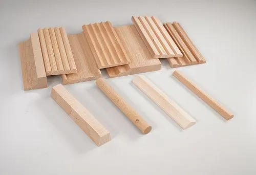 Various options of wooden rails with different cross-sections and shapes