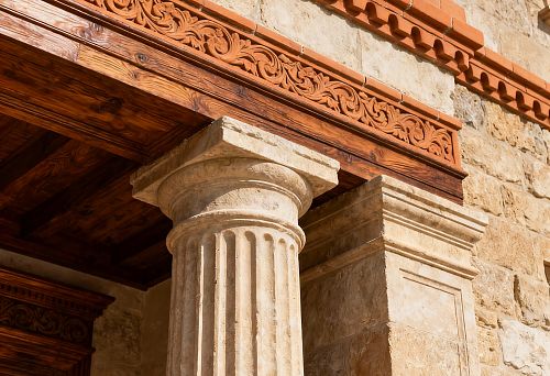 Facade Decor with Column and Carved Elements in Classical Style