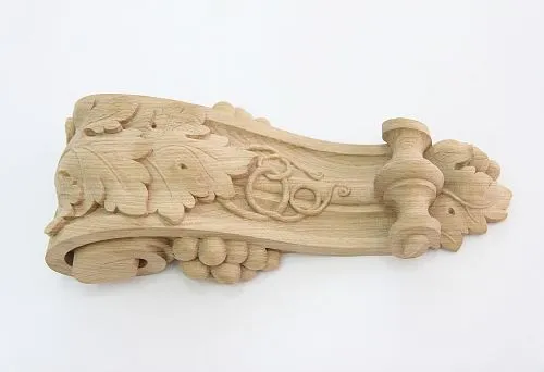 Hand-carved wooden element with plant ornament for interior decoration and creating coziness in the home