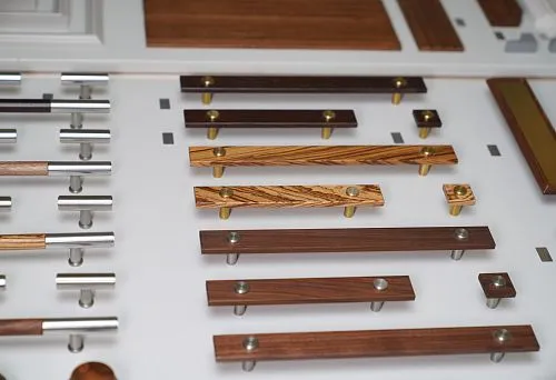 Samples of hardware and finishing materials for design planning.