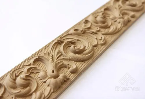 Wooden carved window frame with classical style ornament