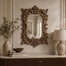 Frame RM-007 for a mirror in an interior with elegant decorative details.