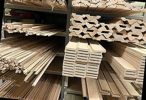 Variety of wooden planks and siding in stock &mdash; natural finishing elements from solid wood.