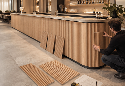 R120 radius check with OPAN-001 sample before cladding the bar counter with PAN-001 panels 1010&times;8&times;950 mm