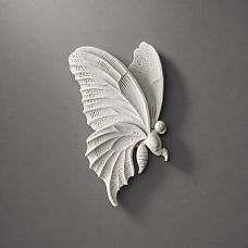 Polyurethane stucco NPU-482L in butterfly shape, close-up