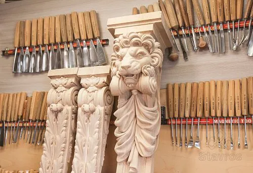 Carved Wooden Brackets and Capitals with Lion Motifs in the STAVROS Workshop Against the Background of Wood Carver's Tools