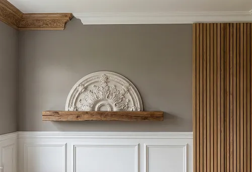 Decorative wall finishing: polyurethane moldings and panels, vertical wooden slats, and a wooden shelf with a decorative molding element