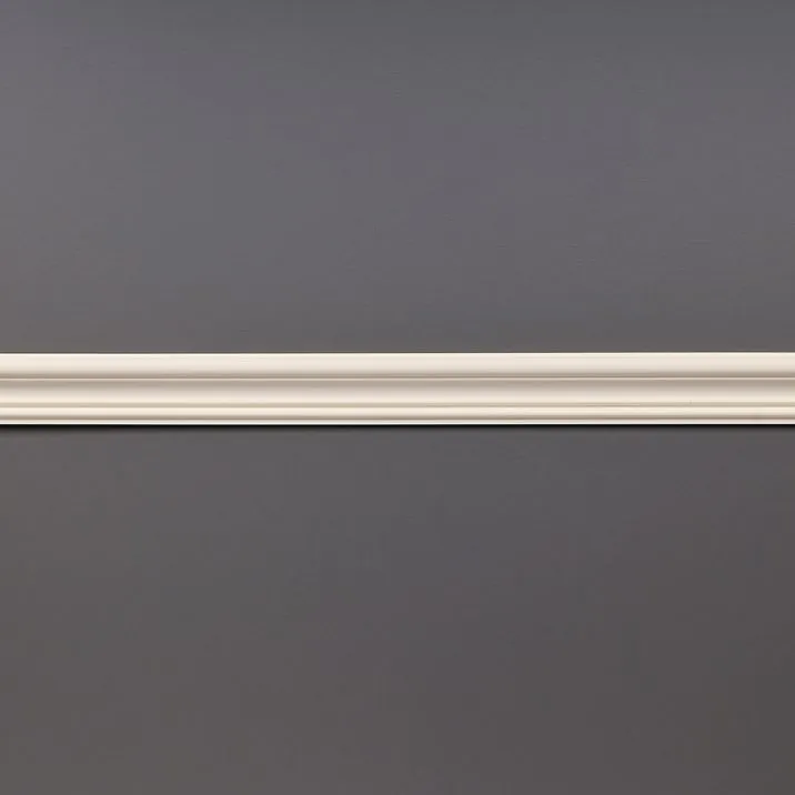 Bathroom with STAVROS polyurethane moldings on white walls&mdash;classic frame panels, gray furniture with gold accents and a marble countertop