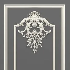 CPU-5-2 top decor close-up: Baroque ornament with scrolls, a shell, and floral motifs against a classic frame