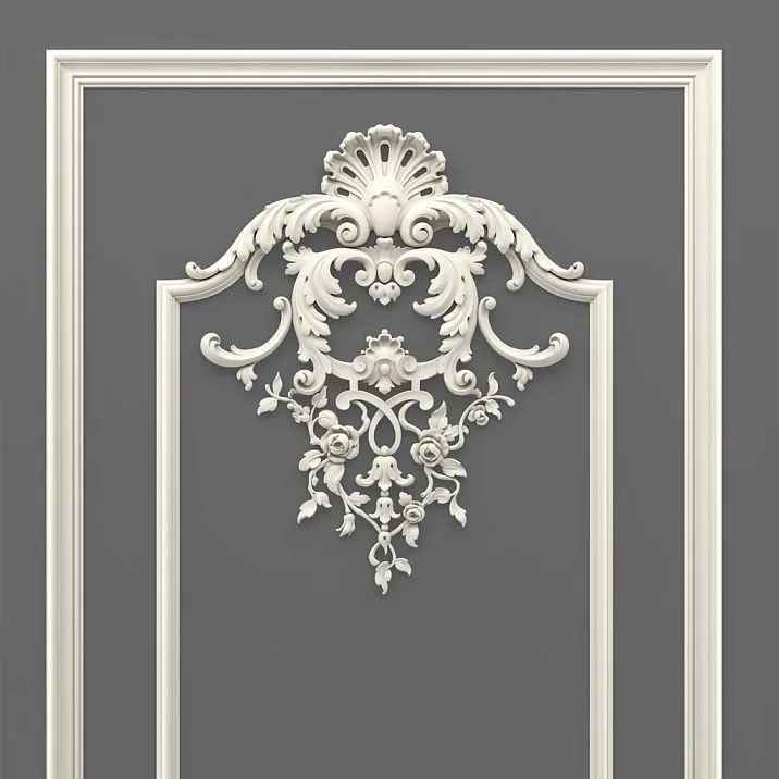 CPU-5-2 top decor close-up: Baroque ornament with scrolls, a shell, and floral motifs against a classic frame