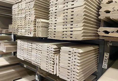 Warehouse with MDF baseboards neatly arranged on shelves