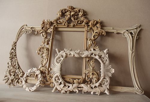 Wooden frames and decorative elements with hand-carved floral ornamentation