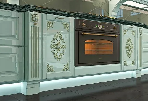 Kitchen interior with elegant white cabinetry and black countertop.