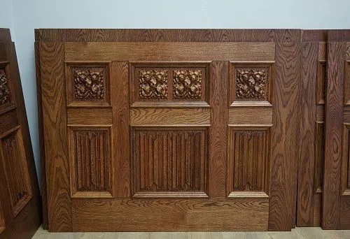 Decorative wooden panel with carved elements and handcrafted 3D ornament
