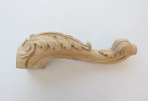 Carved furniture leg made of solid oak with refined design.
