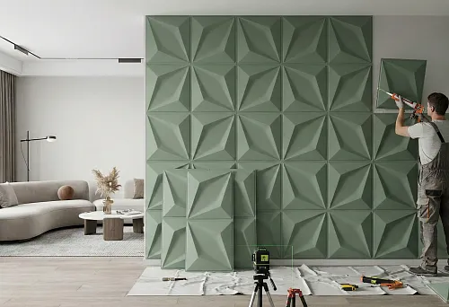 Installation of polyurethane wall panels: a craftsman installs green 3D decorative panels, with tools and a laser level nearby, against the backdrop of a modern living room.