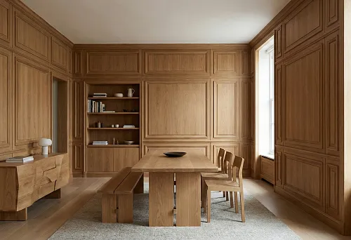 Wooden wall panels: interior with boiserie and solid wood furniture in a unified finish