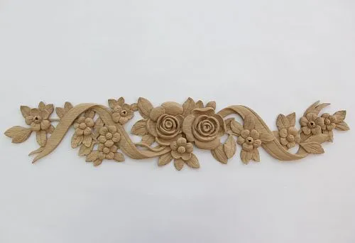 Floral carved decor in solid wood &mdash; roses, flowers, and ribbons, original carving for furniture and interior