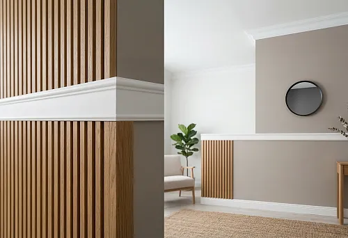 Slat panels with wood texture and white polyurethane molding in a calm modern interior