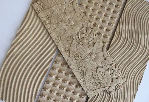Decorative panels with carved wood and intricate patterns