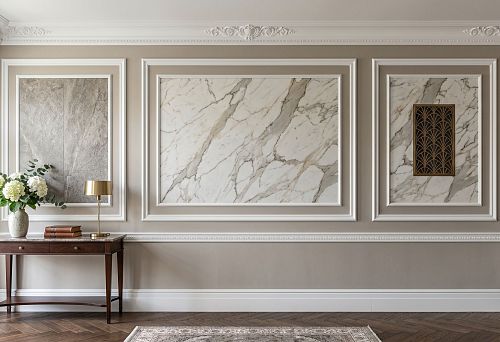 Stucco decor and stone on the wall: how to combine polyurethane moldings with porcelain stoneware, marble and decorative inserts