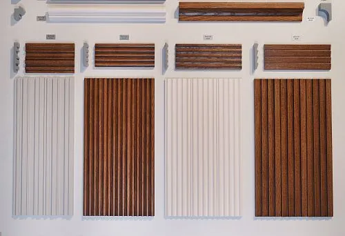 Various profiles of wooden planks, door casings, and trim for decorating the entrance door in classic and modern styles