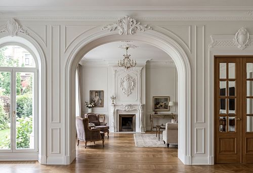 Polyurethane keystone: how to choose the central decor for an arch, door, window, and portal