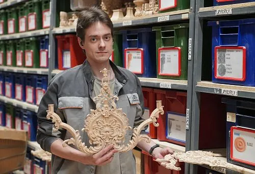 Master with Carved Decorative Wooden Pattern in the STAVROS Workshop
